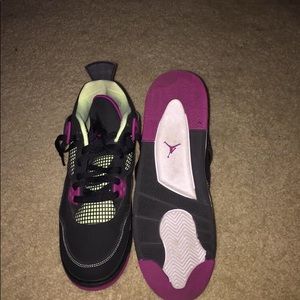 Black and fuchsia Air Jordan’s